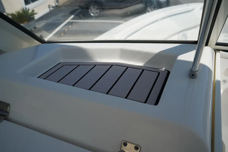 Slide: The Image of 2018 Edgewater 262 CX boat interior detail with sleek design and modern features. - 31