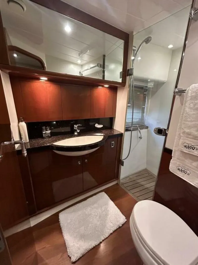 Slide: The Image of Luxurious bathroom in 2008 Princess 67 Flybridge yacht with modern fixtures and elegant design. - 30
