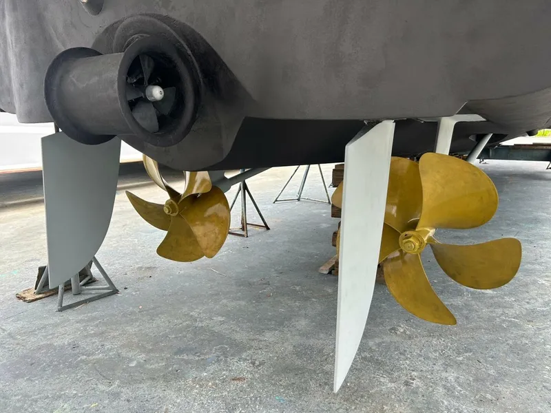 Slide: The Image of Propellers and rudders of a 2008 Princess 67 Flybridge yacht on dry dock. - 35
