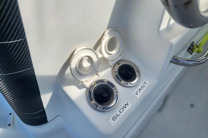 Slide: The Image of Control panel on a 2012 Lagoon 400 boat with slow and fast settings. - 14