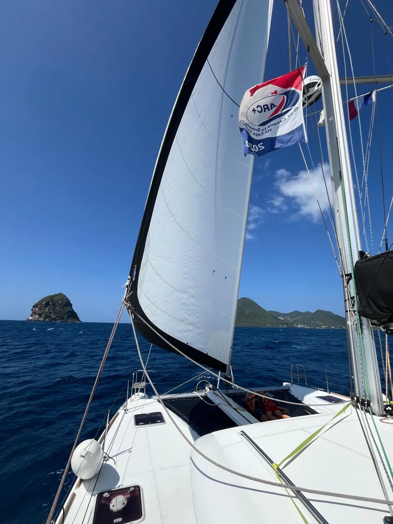 Slide: The Image of Sailing Lagoon 400 catamaran, 2012 model, with scenic ocean and island view. - 50