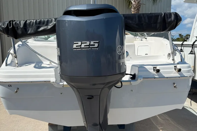 Slide: The Image of 2012 Hurricane SunDeck 217 OB boat with Yamaha 225 outboard motor, rear view. - 7
