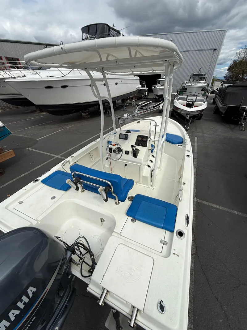 Slide: The Image of 2008 Sailfish 1900 BB Bay Boat with Yamaha engine, docked in a marina. - 7