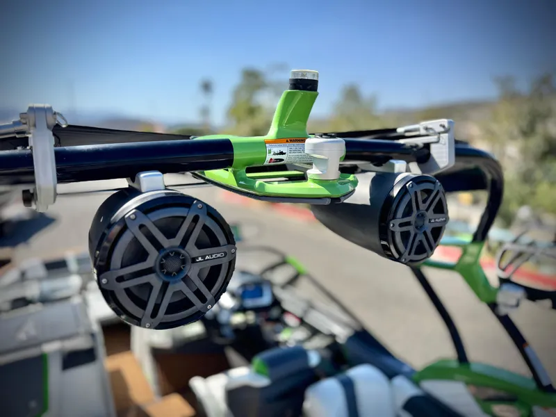 Slide: The Image of 2016 Nautique Super Air G23 boat speakers and tower, close-up view. - 13