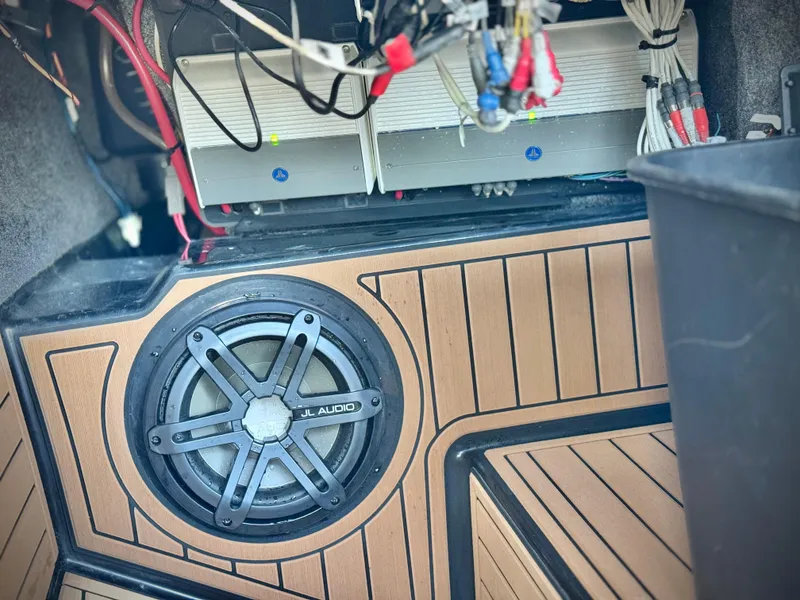 Slide: The Image of 2016 Nautique Super Air G23 audio system with JL Audio subwoofer and wiring. - 34
