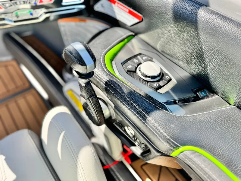 Slide: The Image of Control panel of 2016 Nautique Super Air G23 boat with sleek design and modern features. - 39