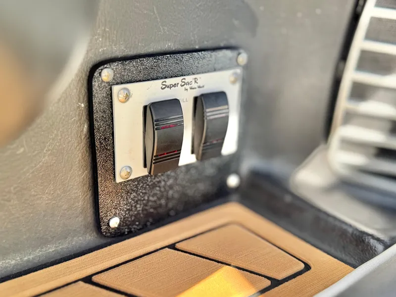 Slide: The Image of Control panel of a 2016 Nautique Super Air G23 boat. - 42