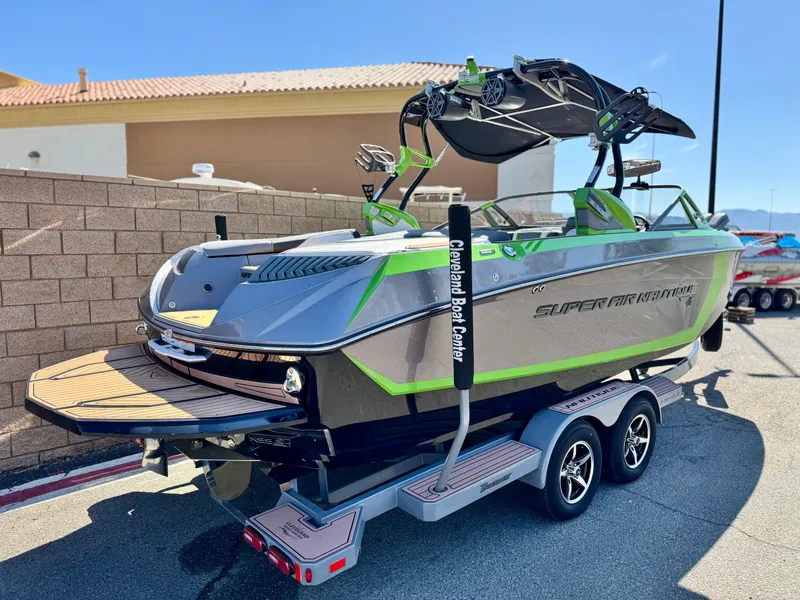 Slide: The Image of 2016 Nautique Super Air G23 boat on trailer, featuring sleek design and vibrant accents. - 5