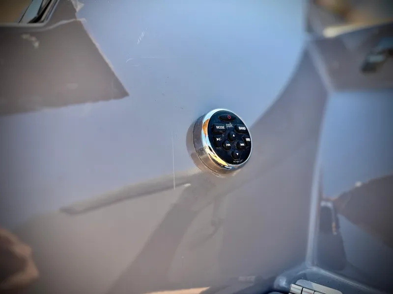 Slide: The Image of Control panel on 2016 Nautique Super Air G23 boat dashboard. - 8