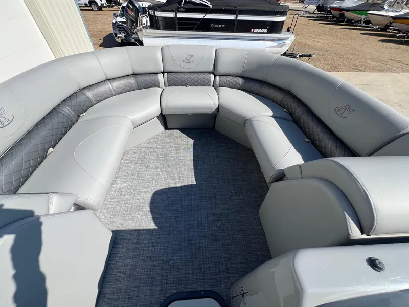 Slide: The Image of 2019 Misty Harbor 2285 Biscayne Bay CU pontoon boat with spacious gray seating area. - 10