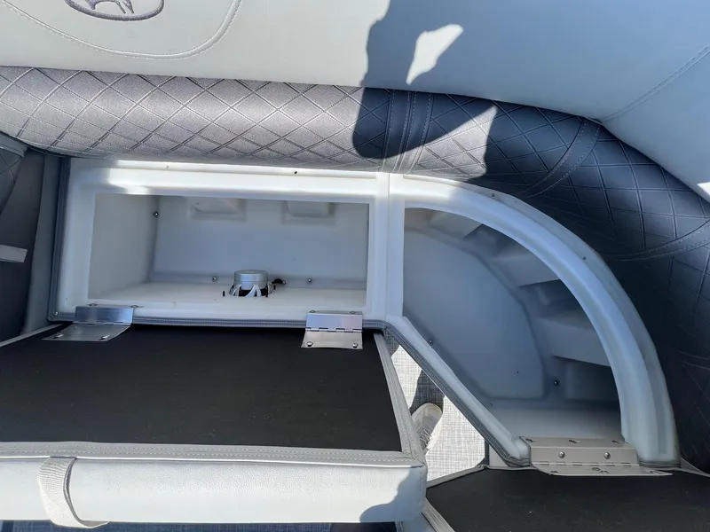 Slide: The Image of Open storage compartment in 2019 Misty Harbor 2285 Biscayne Bay CU boat. - 11