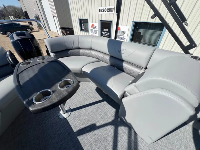 Slide: The Image of 2019 Misty Harbor 2285 Biscayne Bay CU pontoon boat with gray seating and table. - 21