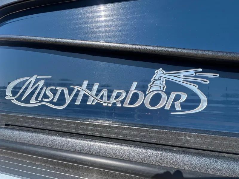 Slide: The Image of Misty Harbor 2285 Biscayne Bay CU 2019 logo on boat exterior. - 4