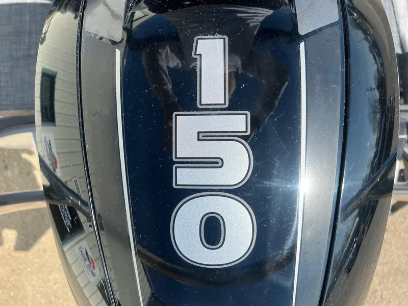 Slide: The Image of Close-up of a 150 horsepower outboard motor on a 2019 Misty Harbor 2285 Biscayne Bay CU. - 8