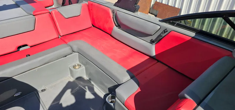Slide: The Image of 2020 Heyday WT-2DC boat interior with red and gray seating. - 10