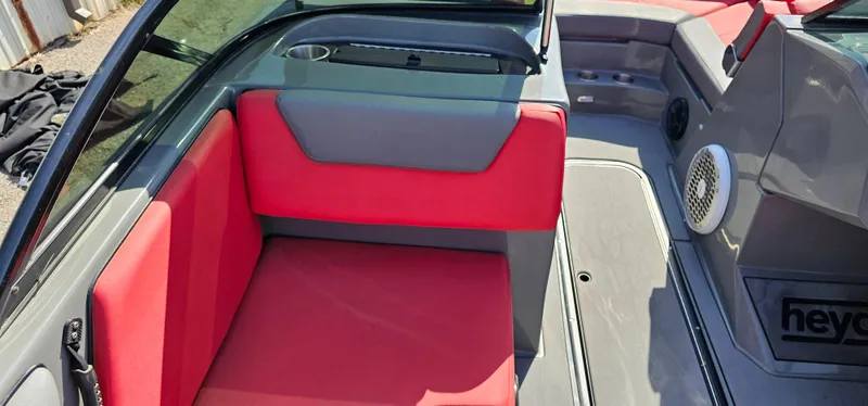 Slide: The Image of 2020 Heyday WT-2DC boat interior with red and gray seating. - 11