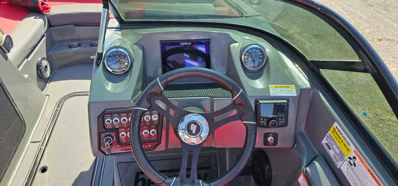 Slide: The Image of 2020 Heyday WT-2DC boat dashboard with steering wheel and control panel. - 13