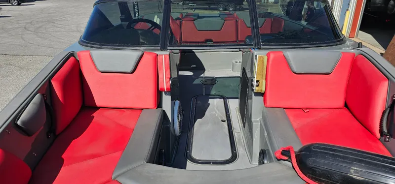 Slide: The Image of 2020 Heyday WT-2DC boat interior with red and gray seating. - 7