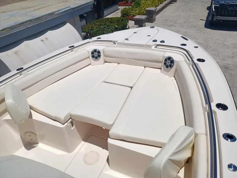 Slide: The Image of 2025 Grady-White Canyon 326 boat with spacious seating and modern design. - 8