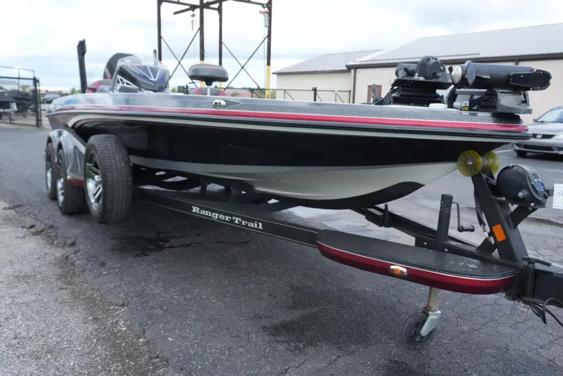 Slide: The Image of 2018 Ranger Z520L boat on trailer, black and red design, parked outdoors. - 3