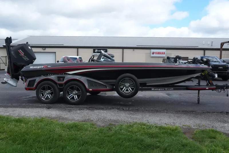 Slide: The Image of 2018 Ranger Z520L boat on trailer, parked outdoors near Yamaha building. - 4