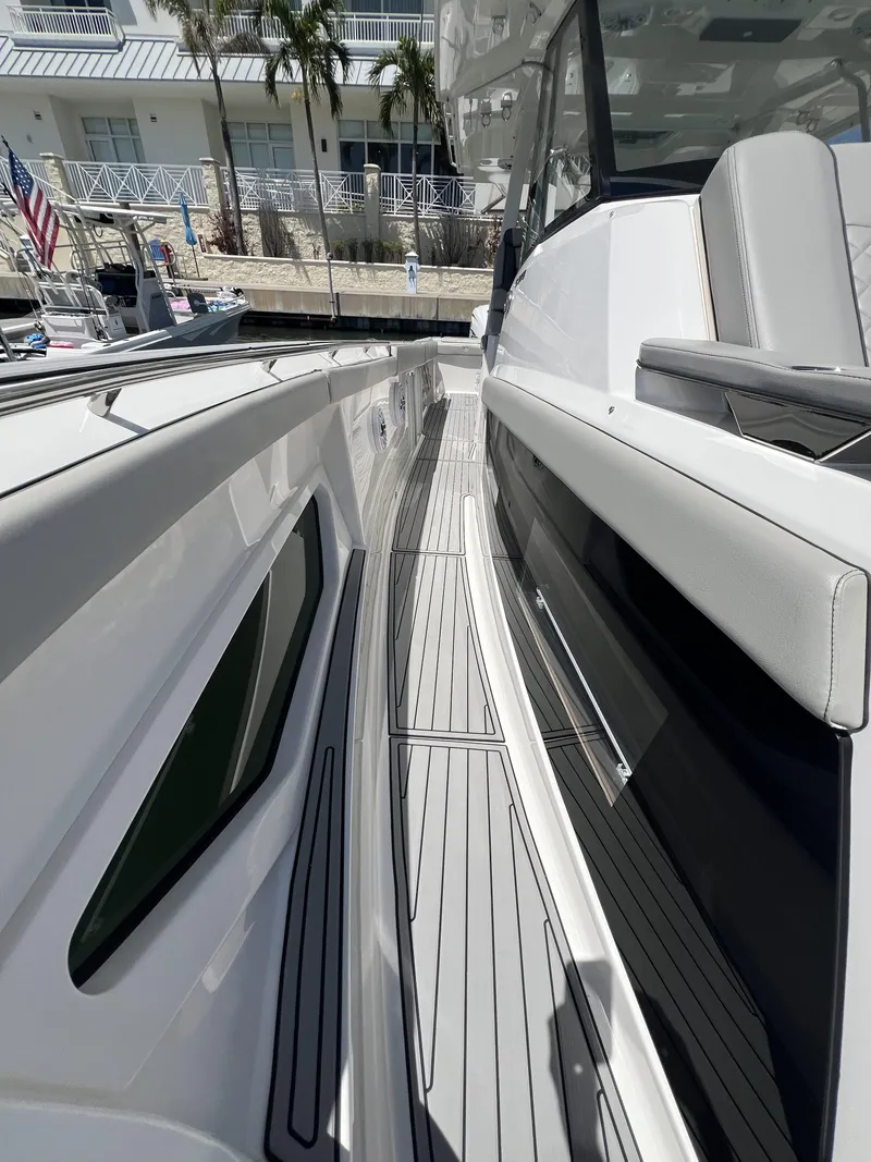 Slide: The Image of 2023 Pursuit S 378 Sport boat deck with sleek design and modern features. - 18