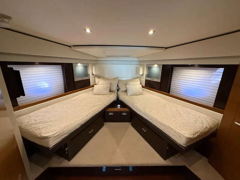Slide: The Image of Luxurious bedroom interior of 2016 Tiara Yachts 50 Coupe with plush bedding. - 19