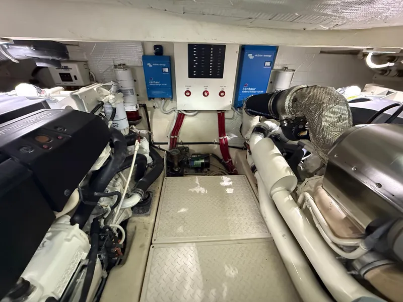 Slide: The Image of Engine room of 2016 Tiara Yachts 50 Coupe, showcasing mechanical components and control systems. - 29