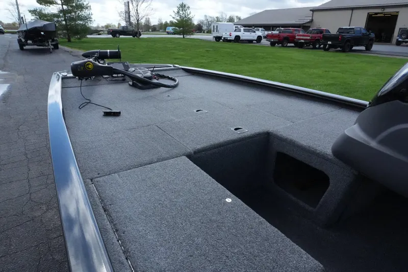 Slide: The Image of 2023 Tracker Pro 170 boat deck with storage compartments and trolling motor. - 12