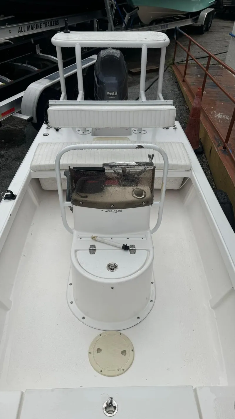 Slide: The Image of 2022 Salt Creek 1500 boat interior with seating and steering console. - 8