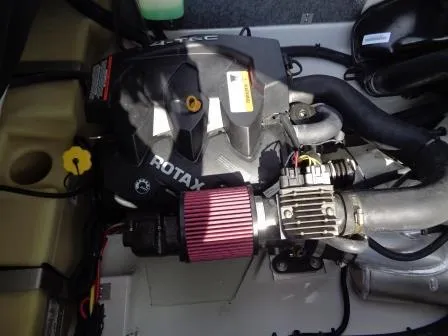 Slide: The Image of Engine of a 2016 Scarab 165G with Rotax components and red air filter. - 14