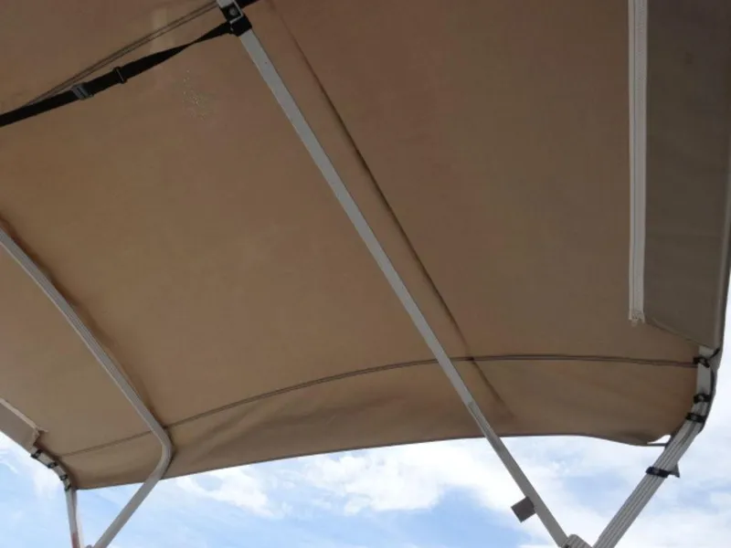 Slide: The Image of Bimini top of 2008 Crest III XRS boat against a blue sky background. - 16