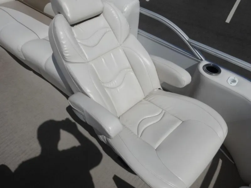 Slide: The Image of Luxurious white leather seat on 2008 Crest III XRS boat, featuring ergonomic design and armrests. - 6