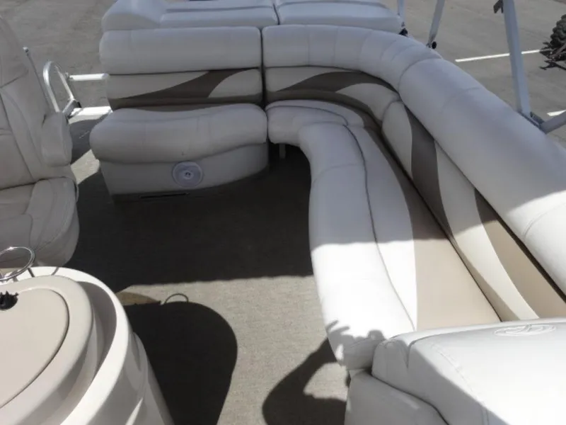 Slide: The Image of 2008 Crest III XRS boat interior with white and beige seating arrangement. - 9
