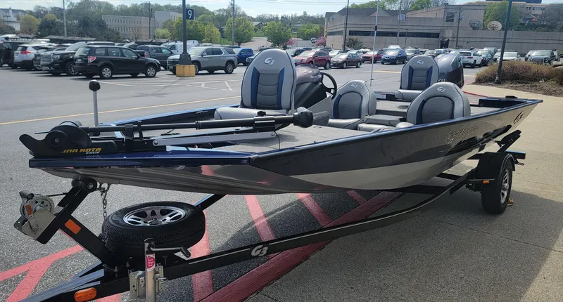 Slide: The Image of 2018 G3 Sportsman 17 boat on trailer in parking lot. - 5