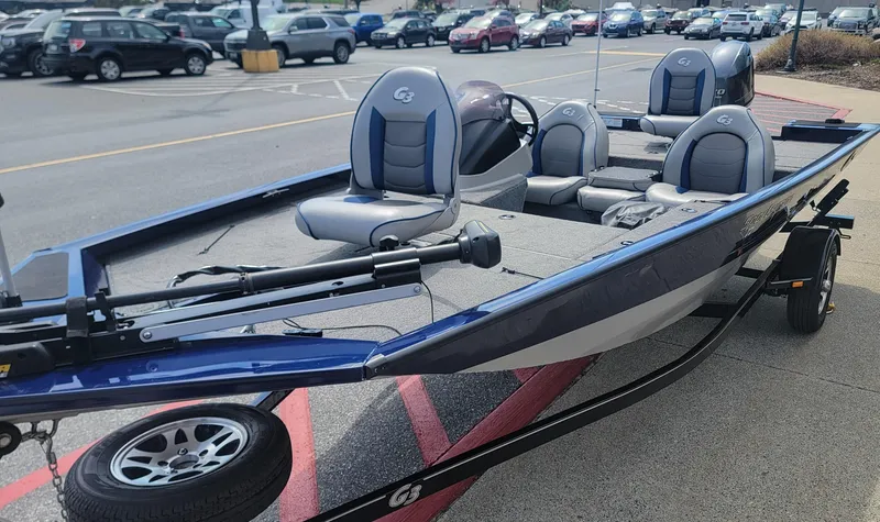 Slide: The Image of 2018 G3 Sportsman 17 boat with seating, parked in a lot. - 6
