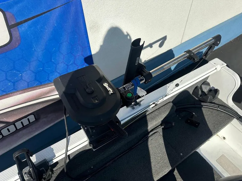 Slide: The Image of 2011 Lund 1625 Rebel XL Sport boat with mounted fishing equipment. - 21