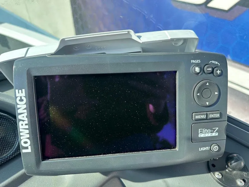 Slide: The Image of Lowrance Elite-7 GPS fishfinder on 2011 Lund 1625 Rebel XL Sport boat. - 27