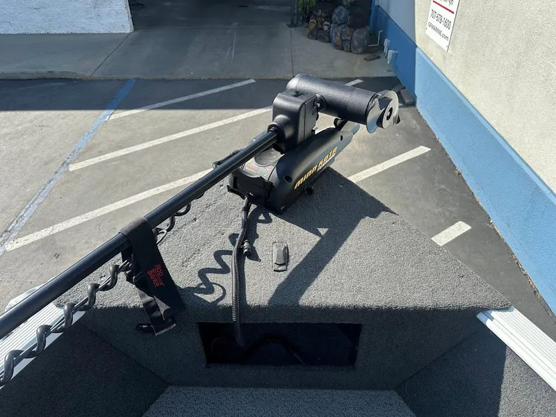 Slide: The Image of 2011 Lund 1625 Rebel XL Sport boat with trolling motor on deck. - 33