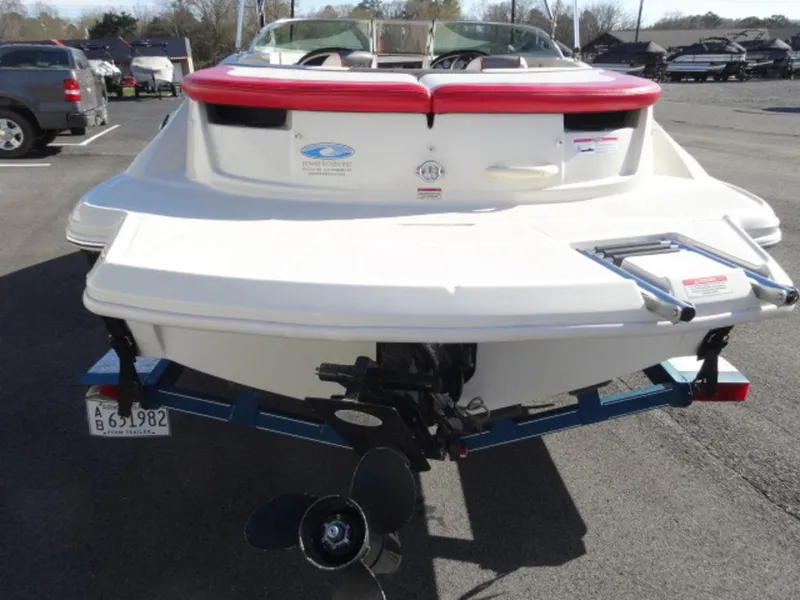 Slide: The Image of 2007 Sea Ray 185 Sport boat, rear view, on a trailer in a parking lot. - 4