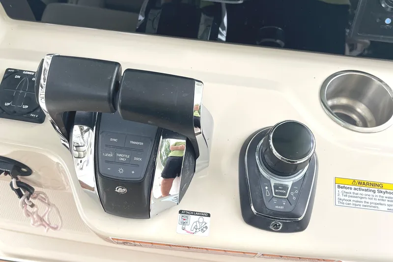 Slide: The Image of Control panel of a 2018 Boston Whaler 380 Outrage boat with throttle and joystick. - 8