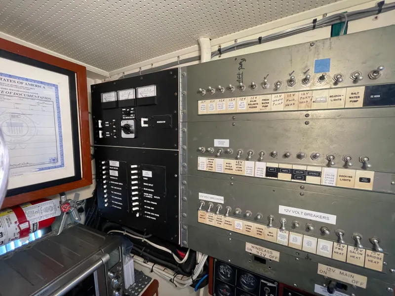 Slide: The Image of Electrical control panel inside a 1966 Huckins Sportsman boat. - 39