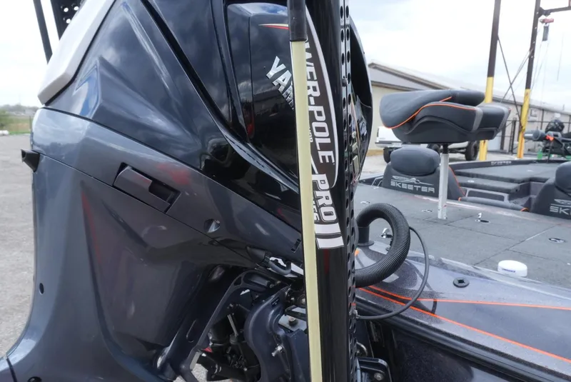 Slide: The Image of 2018 Skeeter ZX200 boat with Power-Pole Pro II and Yamaha engine, close-up view. - 11