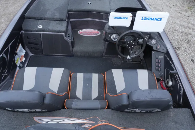 Slide: The Image of 2018 Skeeter ZX200 boat interior with Lowrance electronics and dual seating. - 15