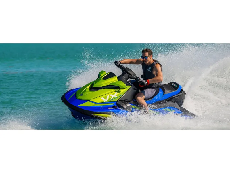 Slide: The Image of 2024 Yamaha VX Limited HO jet ski on turquoise water, rider enjoying high-speed adventure. - 7