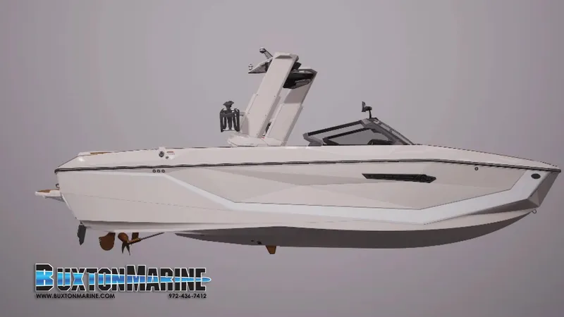 Slide: The Image of 2025 Nautique Super Air Nautique G25 boat, side view, displayed by Buxton Marine. - 1