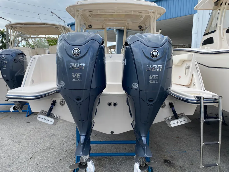 Slide: The Image of 2022 Grady-White Freedom 325 boat with dual Yamaha 300 V6 outboard engines. - 14