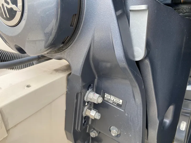 Slide: The Image of Close-up of a 2022 Grady-White Freedom 325 boat engine component. - 15