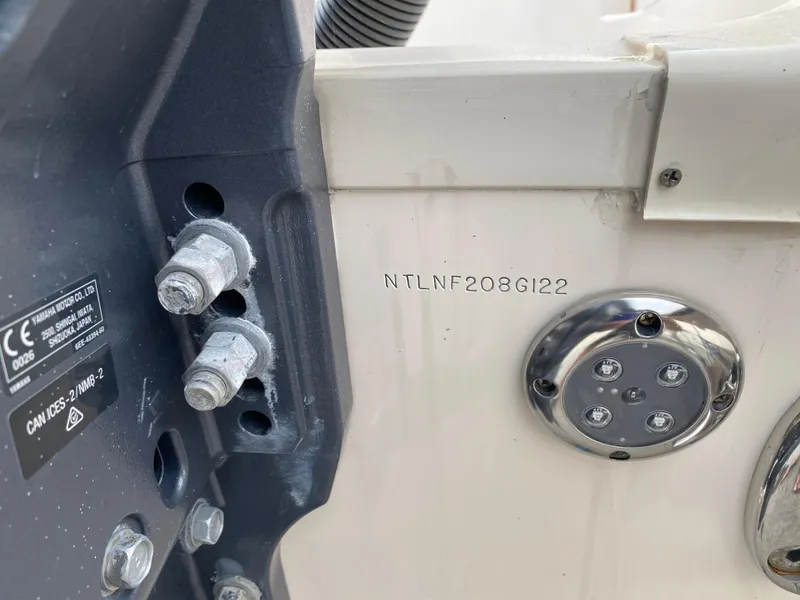 Slide: The Image of 2022 Grady-White Freedom 325 boat hull detail with serial number and hardware. - 17