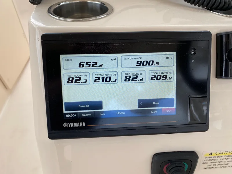 Slide: The Image of Yamaha display on 2022 Grady-White Freedom 325 showing fuel usage and trip data. - 9